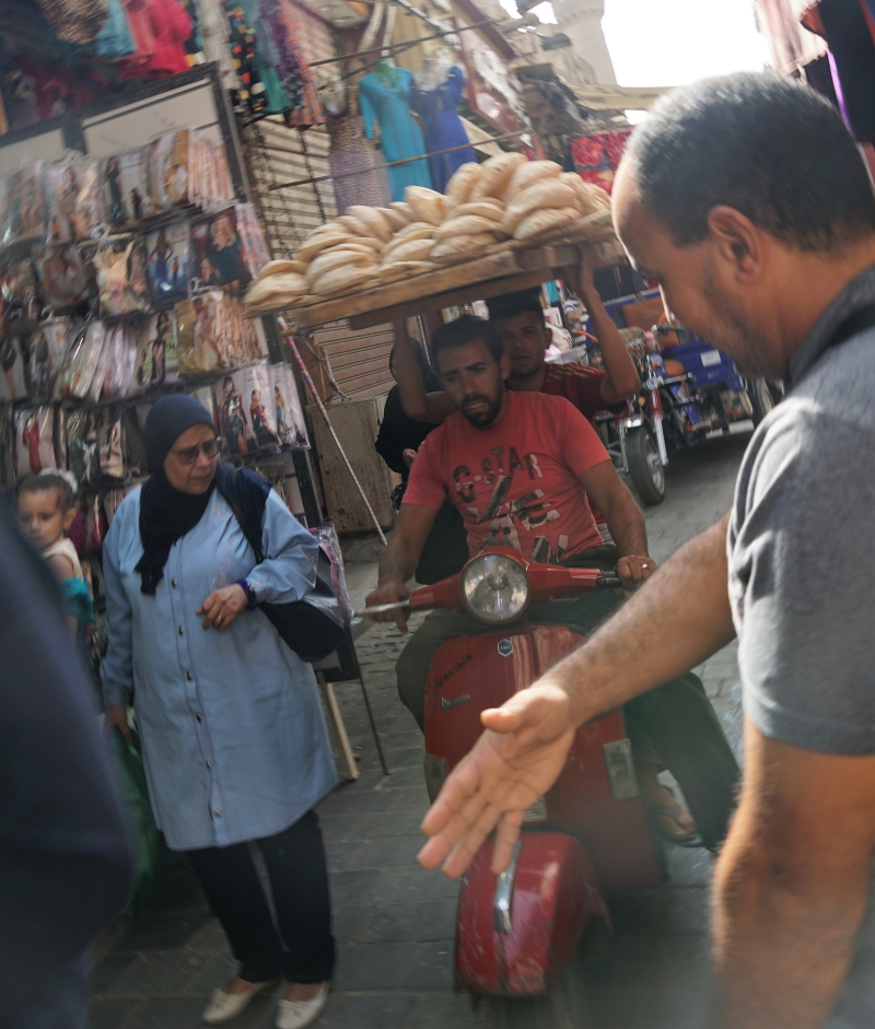 Transporting bread in the market in Cairo